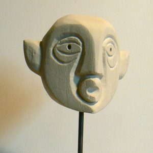 Esprit 3 - Tuffeau - 19 x 9 x 8 cm - 2019 Visage en pierre (tuffeau) Sculpture de Fred Soula, sculpteur en Dordogne